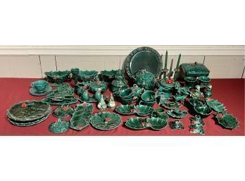 Appraisal: Sixty-five pieces of Christmas Holly chins including three sleighs L