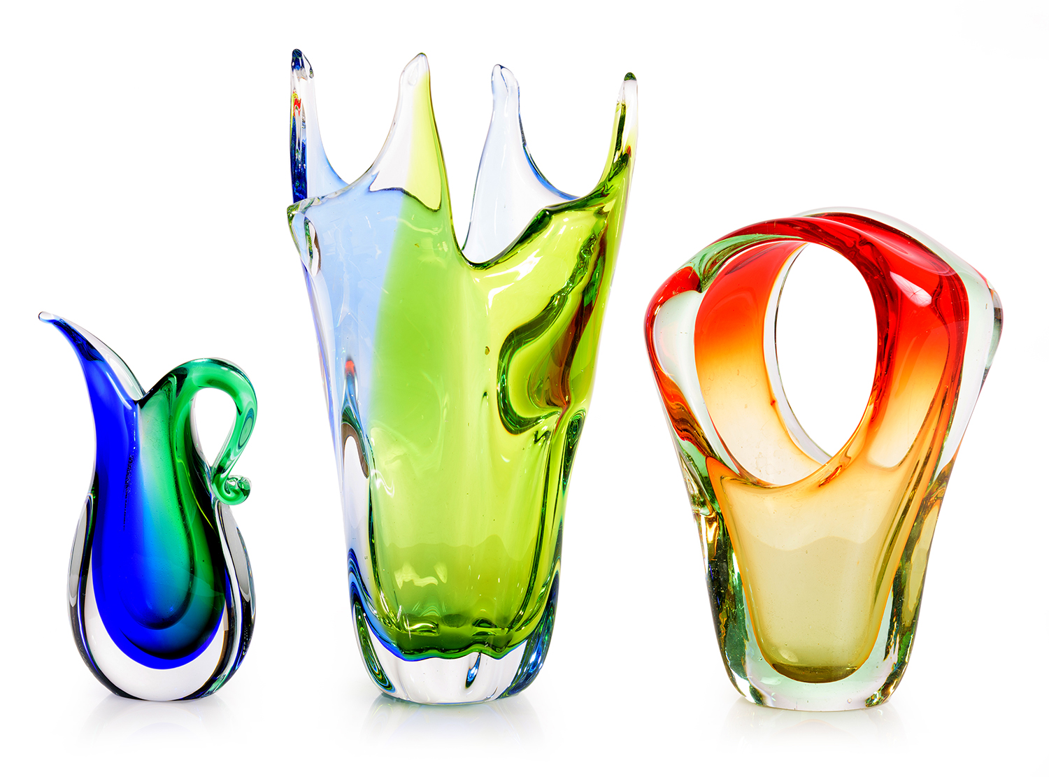 Appraisal: THREE ITALIAN SOMMERSO ART GLASS VASES Varying shapes and colours