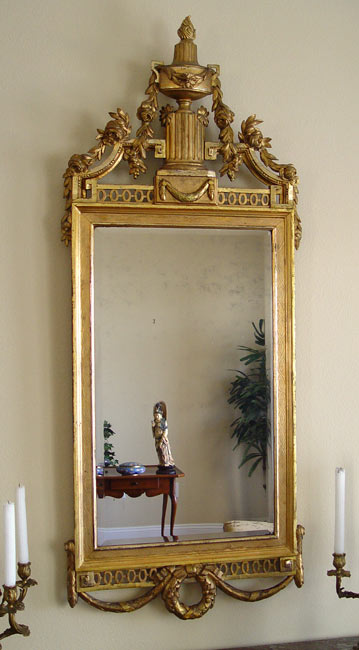 Appraisal: th C FRENCH GILTWOOD LOOKING GLASS The frame with a