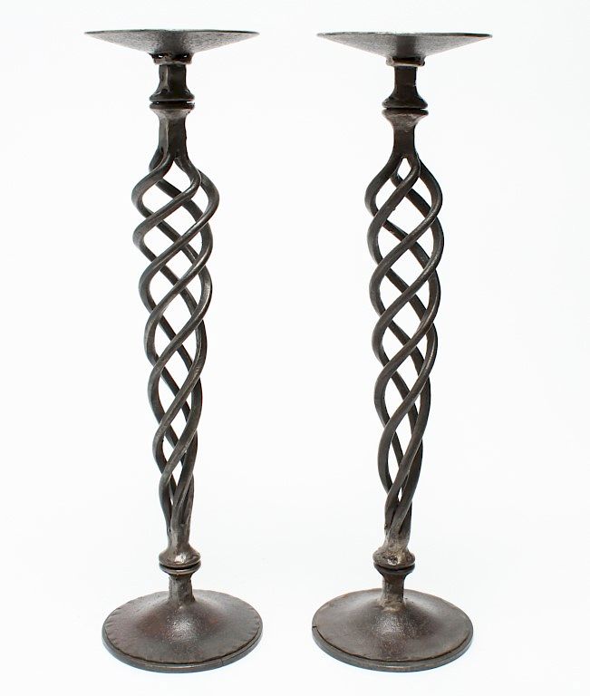 Appraisal: Wrought Iron Pricket Candlesticks Pair Pair of wrought iron pricket