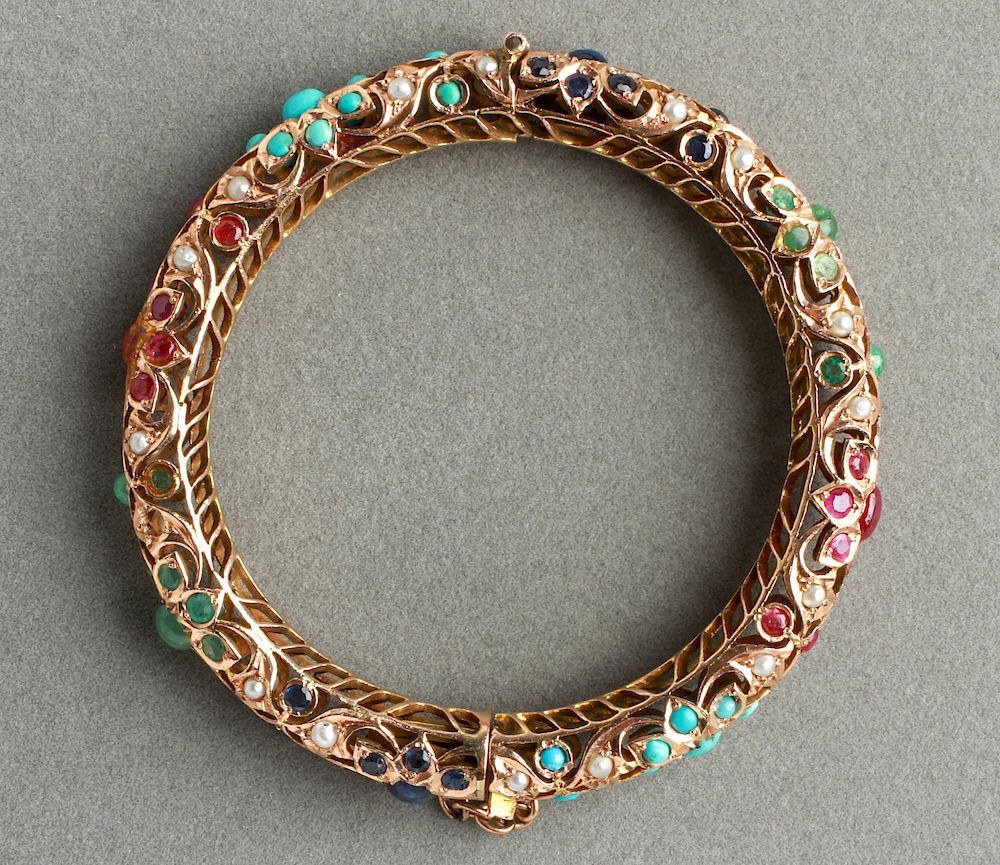 Appraisal: K Gold Rubies Sapphires Emeralds Bangle Bracelet K yellow gold