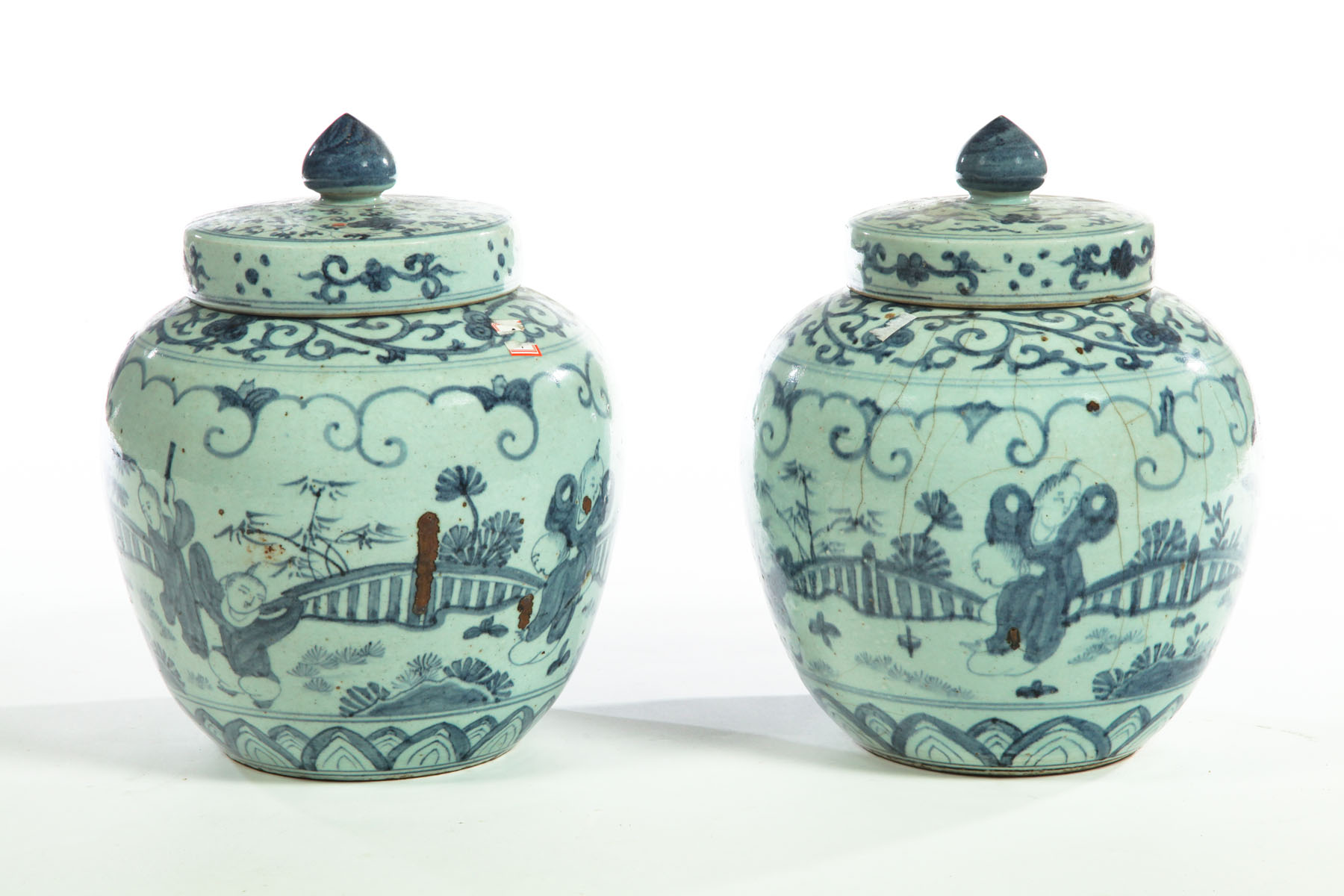 Appraisal: PAIR OF COVERED JARS China ca s Ming-style covered jars