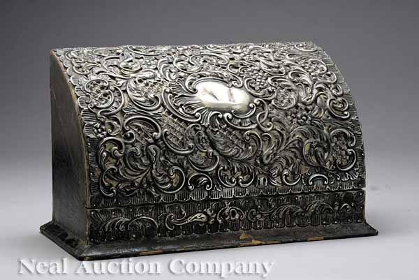 Appraisal: A Victorian Silver Repouss and Leather Stationery Box chased pierced