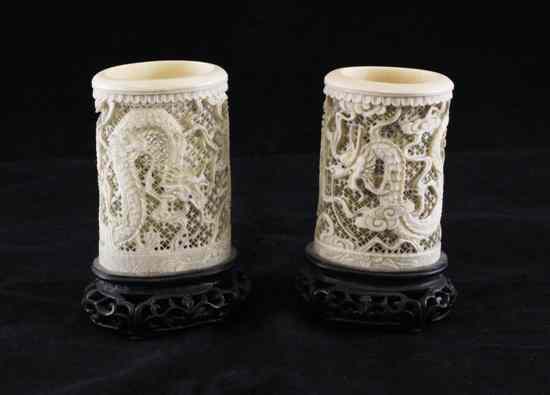 Appraisal: A pair of Chinese export ivory tusk vases late th