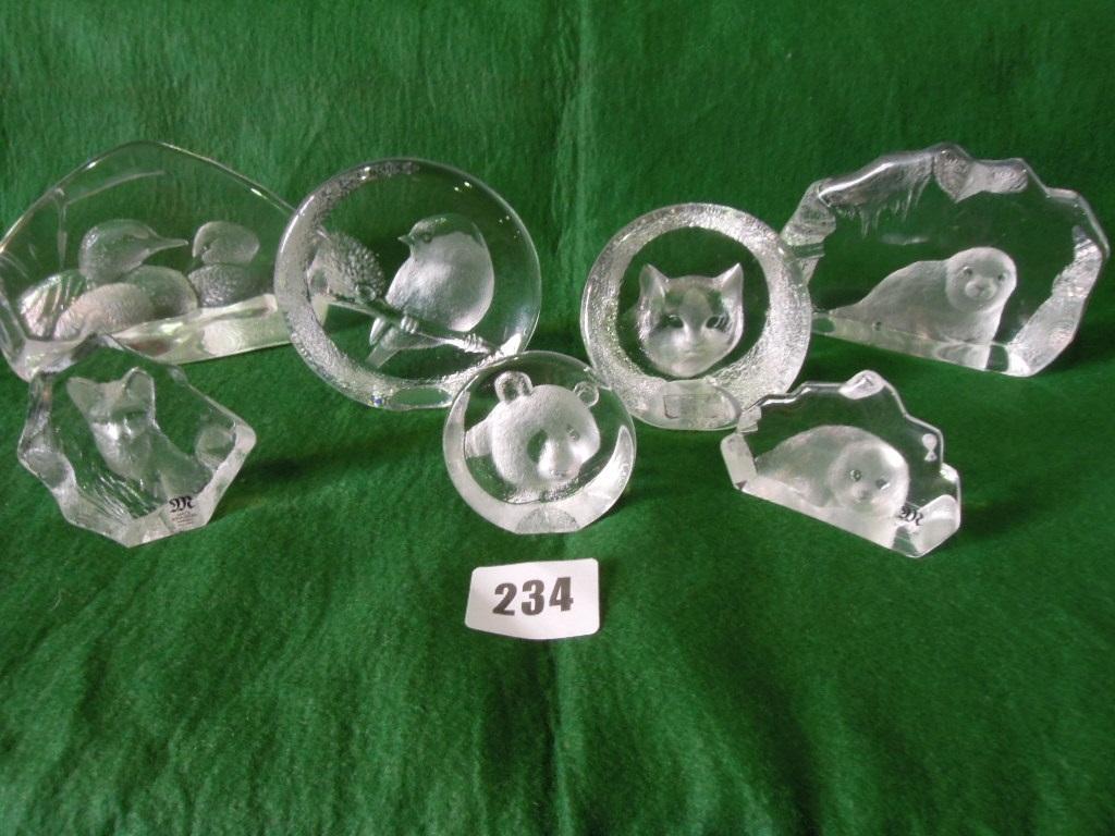 Appraisal: A collection of Mats Jonasson Swedish glass paperweights modelled with