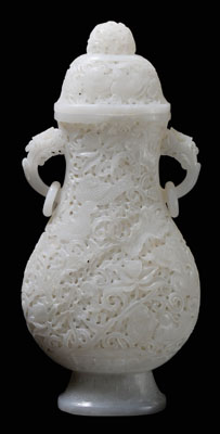 Appraisal: White Jade Hu-Form Lidded Vase Qing Dynasty translucent lychee white