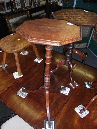 Appraisal: A TH CENTURY MAHOGANY OCTAGONAL WINE TABLE with turned column