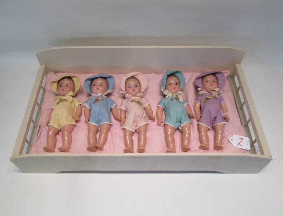 Appraisal: FIVE MADAME ALEXANDER DIONNE QUINTUPLET DOLLS WITH CRIB each doll