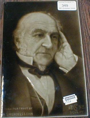 Appraisal: A sepia glazed portrait tile - William Gladstone by Sherman