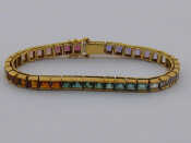 Appraisal: A yellow metal tests carat gold multi gem bracelet approx