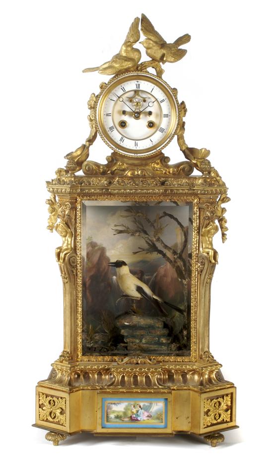 Appraisal: A French Porcelain Mounted Gilt Bronze Singing Bird Automaton Mantel