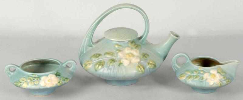 Appraisal: Roseville -Piece Blue White Rose Teapot Set Description