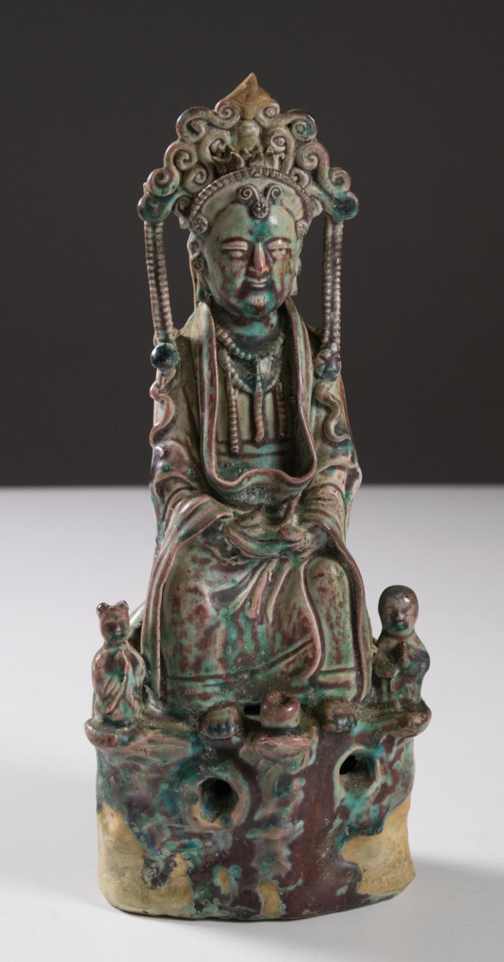 Appraisal: CHINESE POTTERY GUANYIN SCULPTURE with polychrome glaze depicting Guanyin in