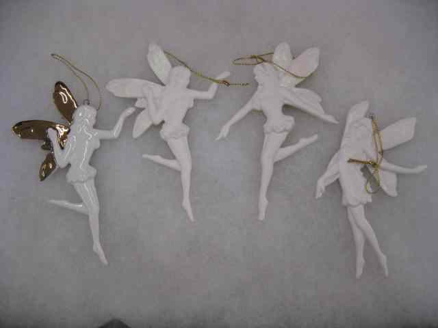 Appraisal: Figural Porcelain Christmas Ornaments fairies in flight '' excellent