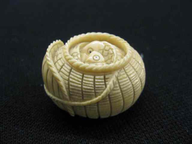 Appraisal: Carved Ivory Netsuke fish in basket '' x '' signed