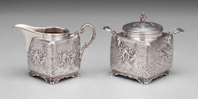 Appraisal: German sterling sugar and creamer square forms with dancing and