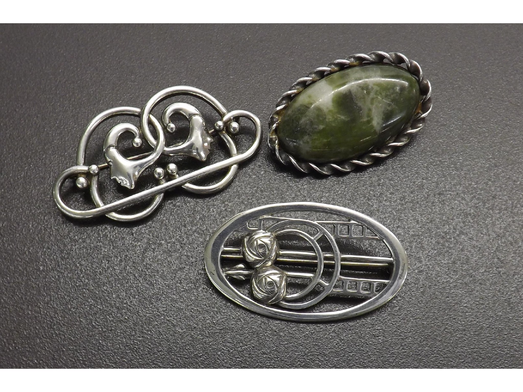 Appraisal: Three differing silver Scottish brooches of various designs