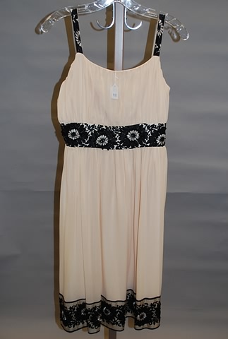 Appraisal: Black and peach print with beads and black sequins Silk