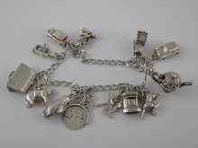 Appraisal: A white metal tests silver charm bracelet comprising approx charms