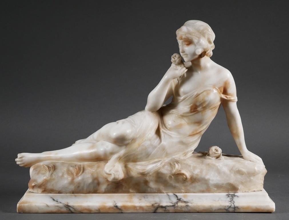 Appraisal: Reclining girl marble Chipped toe - wide - deep and