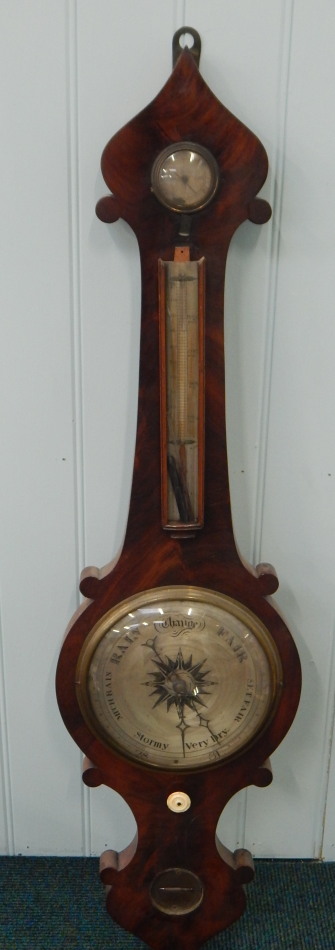 Appraisal: A Victorian wheel barometer by Puibus in a figured mahogany