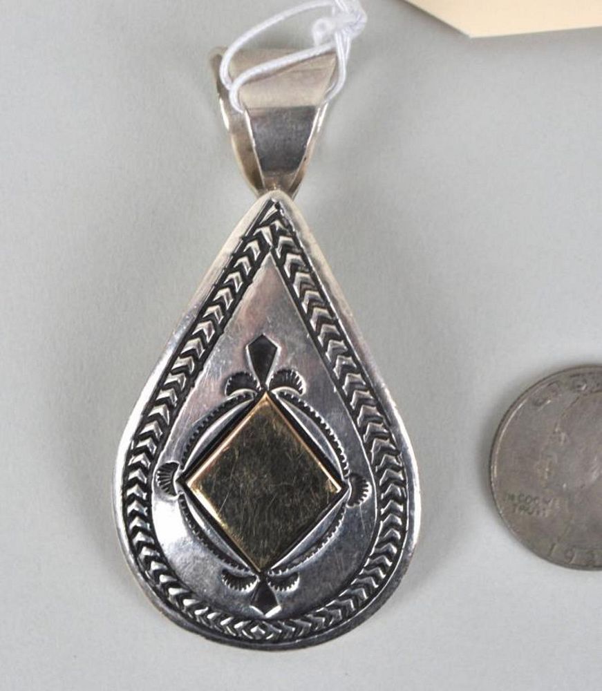 Appraisal: Native American Stamped Pendant marked RT sterling K high wide