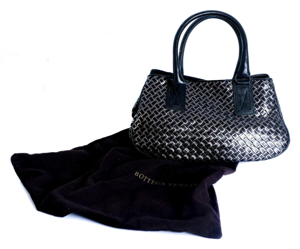 Appraisal: BOTTEGA VENETA SILVER AND BLACK WOVEN PURSEBottega Veneta black and