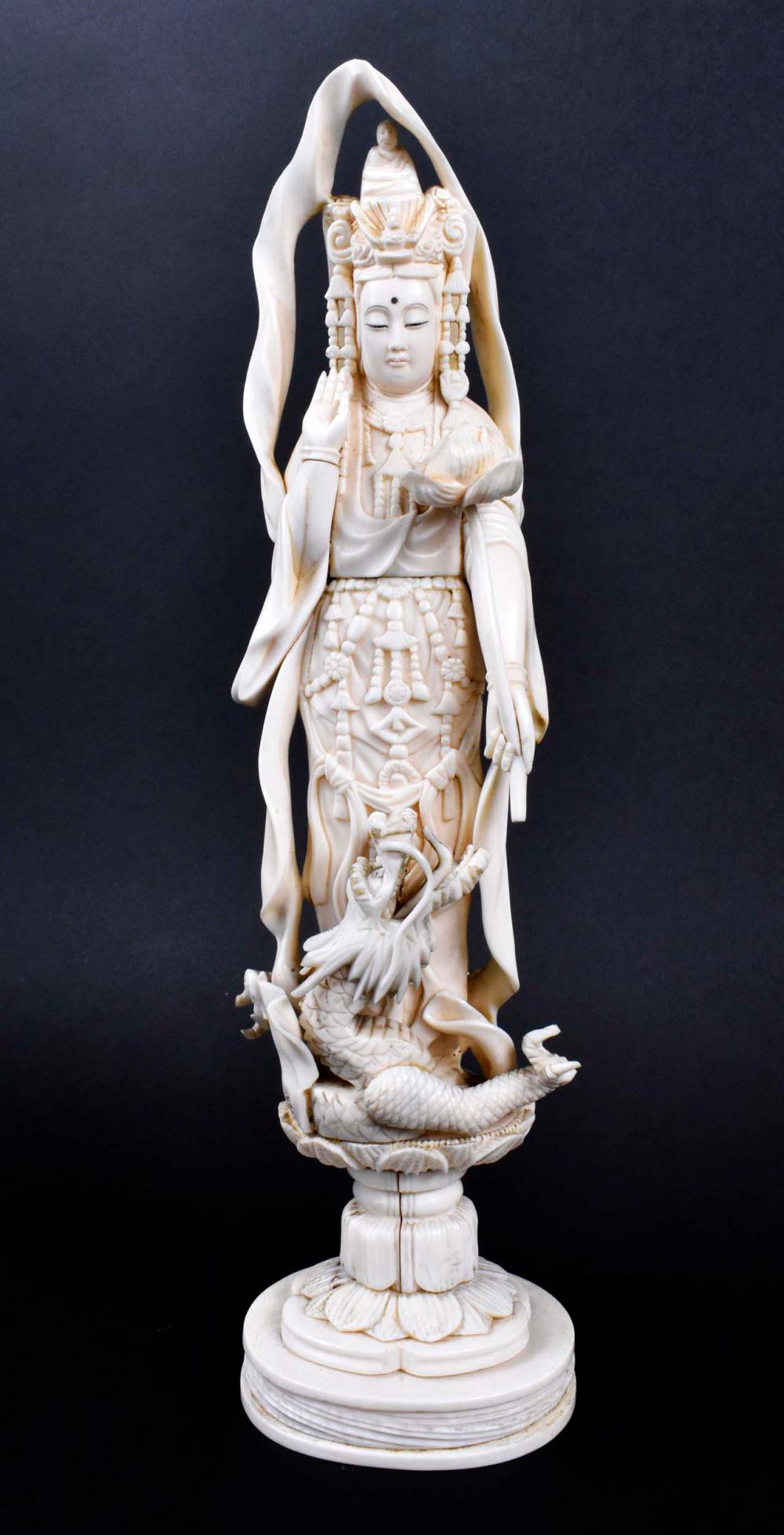 Appraisal: CHINESE CARVED FIGURE OF THE GODDESS KANONThe elaborately dressed deity