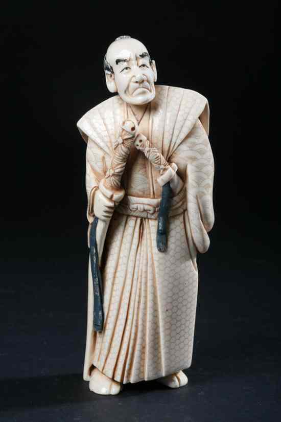 Appraisal: JAPANESE CARVED IVORY OKIMONO OF SAMURAI - in high