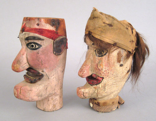 Appraisal: Two carved and painted marionette heads of Punch and Judy