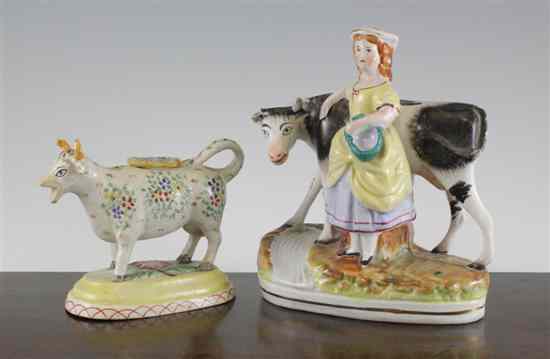 Appraisal: A Staffordshire pottery cow creamer th century the cow creamer