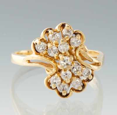 Appraisal: A Ladies' Diamond Cluster Ring k yellow gold ring set