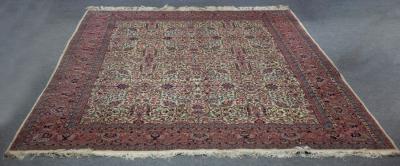 Appraisal: An Eastern rug of aubergine ground decorated all over with