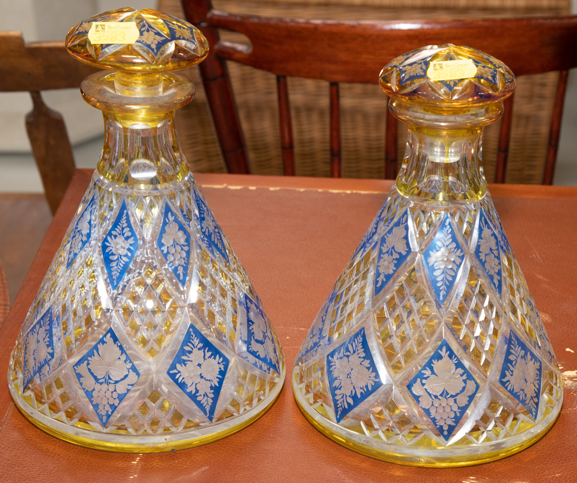 Appraisal: A PAIR OF BOHEMIAN CUT GLASS DECANTERS st half th