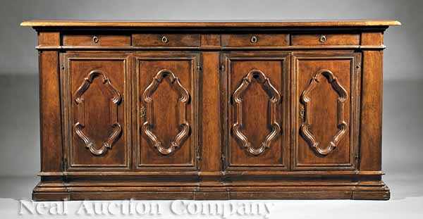 Appraisal: An Antique Italian Renaissance-Style Carved Walnut Credenza th c molded