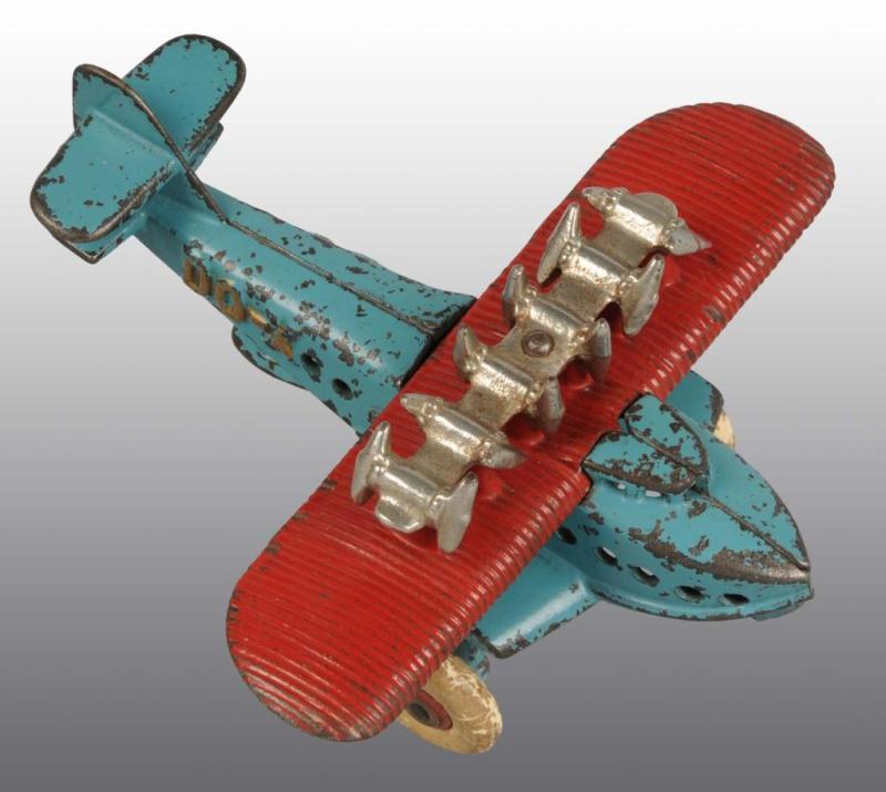 Appraisal: Cast Iron DO-X Airplane Toy Description About five of these