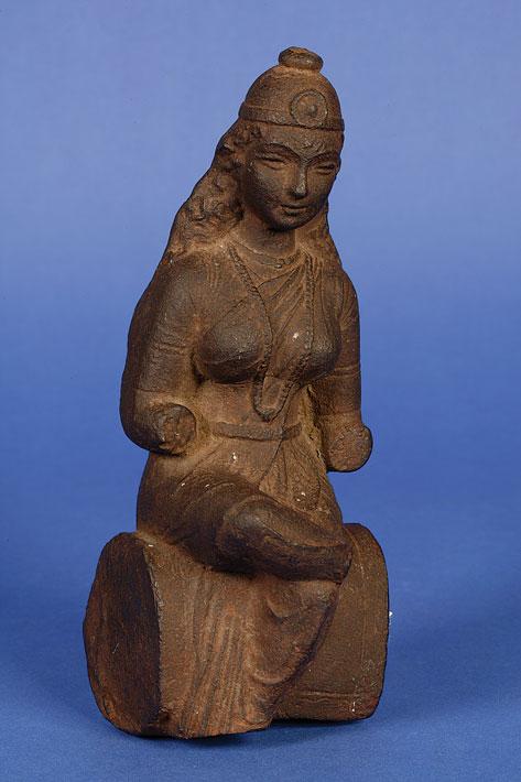 Appraisal: A SASANIAN STYLE IRON FIGURE of a seated female deity