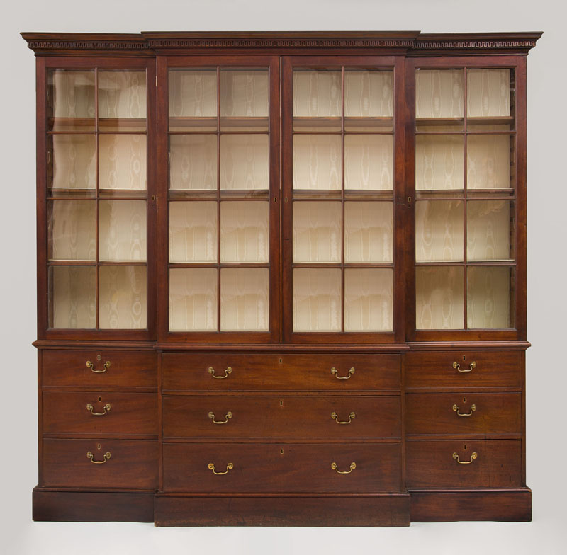 Appraisal: GEORGE III MAHOGANY BREAKFRONT BOOKCASE The dentil molded cornice above