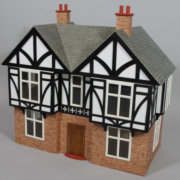 Appraisal: A modern doll's house of Mock Tudor outline with realistic