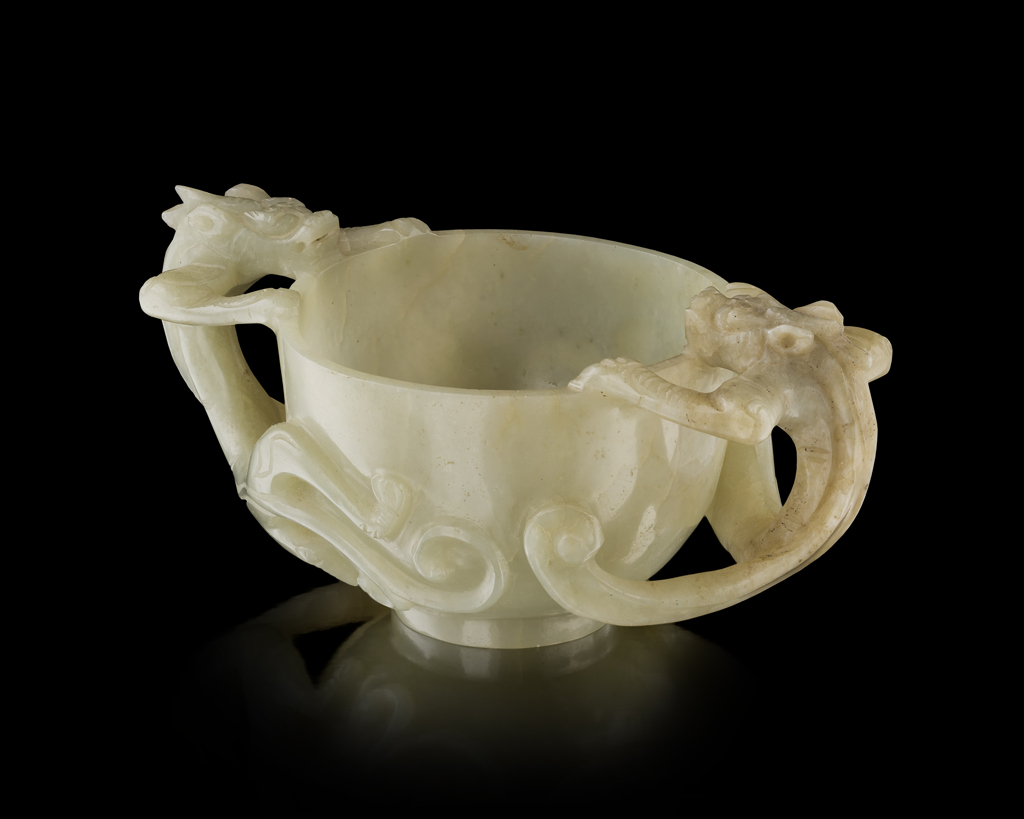 Appraisal: CELADON JADE LIBATION CUP QING DYNASTY TH CENTURY carved in