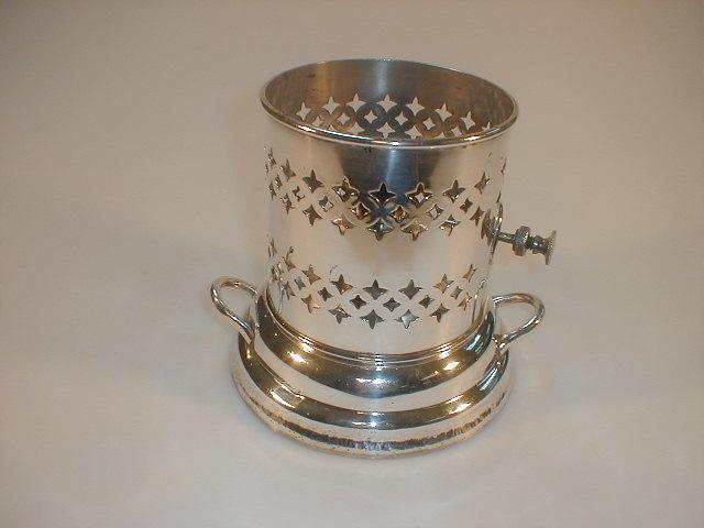 Appraisal: An EPNS food stand incorporating a spirit burner on a