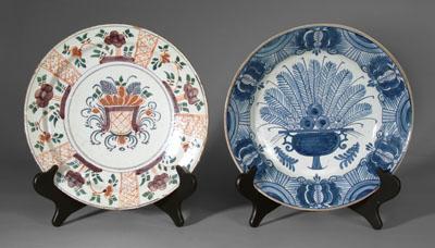 Appraisal: Two Delft chargers one with bowl with fruit and flowers