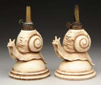 Appraisal: PAIR OF FIGURAL MINI LAMPS Unlisted Snail figures on a