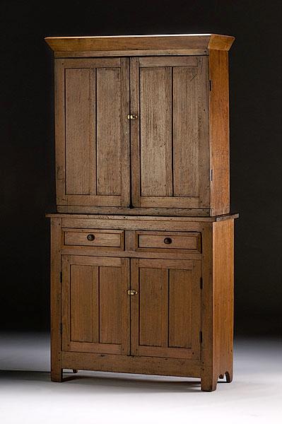 Appraisal: STEPBACK CUPBOARD IN WALNUT American ca - with poplar secondary