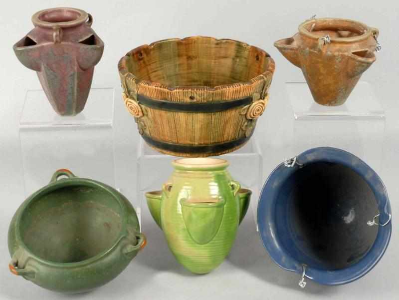 Appraisal: Lot of Various Pottery Hanging Planters Description Includes one Weller