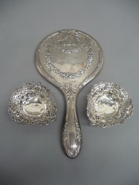 Appraisal: A pair of sterling silver pierced heart form trinket dishes