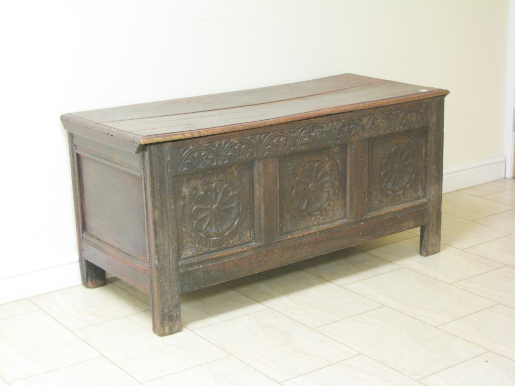 Appraisal: A th Century oak Coffer with plank lid above three