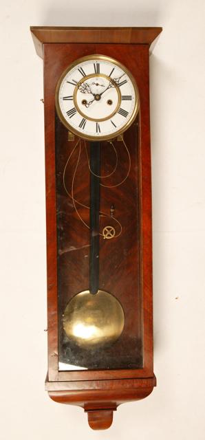 Appraisal: A MAHOGANY CASED VIENNA TYPE WALL CLOCK the white enamel