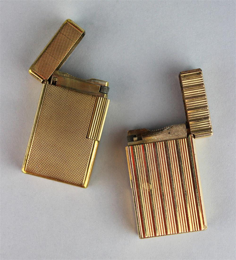 Appraisal: TWO S T DUPONT GOLD-TONE LIGHTERS one marked S T