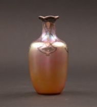 Appraisal: A Signed Quezal Vase with Silver Overlay Iridescent vase features